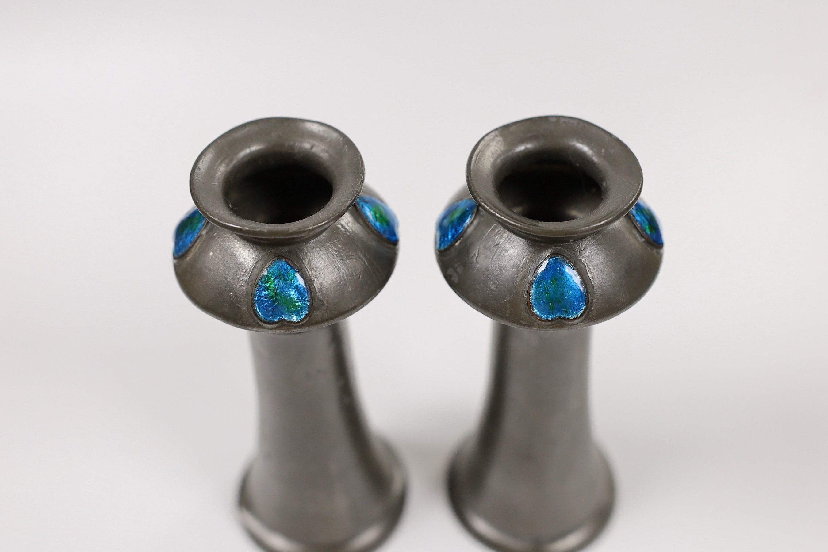 A pair of Liberty's Tudric pewter posy vases, 16cm tall